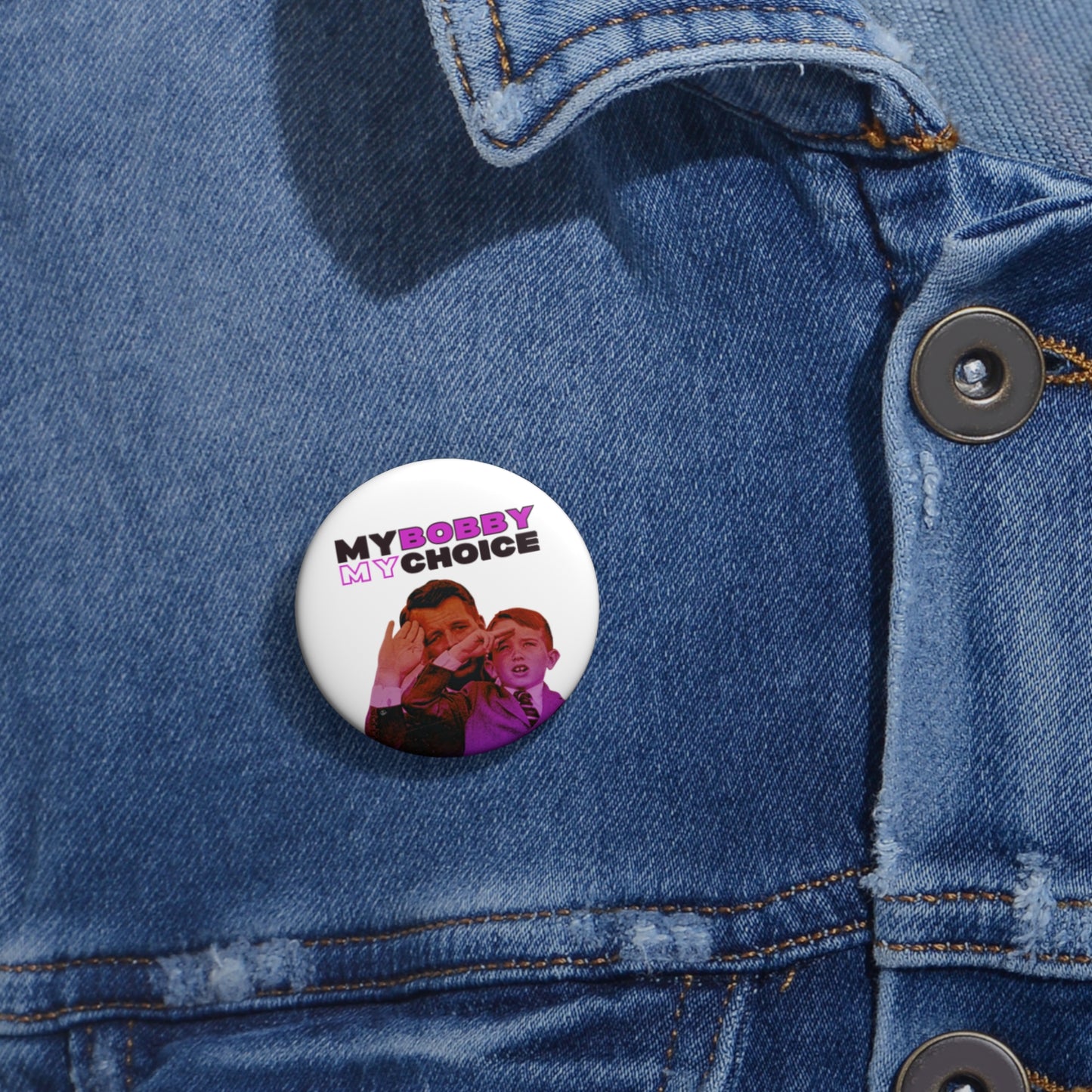 A round pin button on a denim jacket reads MY BOBBY MY CHOICE, featuring an image of two people, one waving. Assembled in the USA, this accessory echoes fervent support reminiscent of RFK Jr.s legacy.