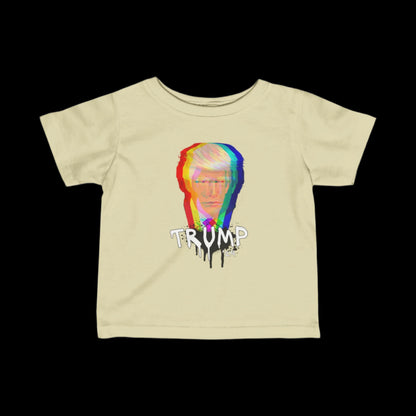 This cotton beige T-shirt showcases a stylized, multicolored image of a mans face with TRUMP in bold, dripping letters below. The Trump-graffiti art design features a glitch effect set against a black background.