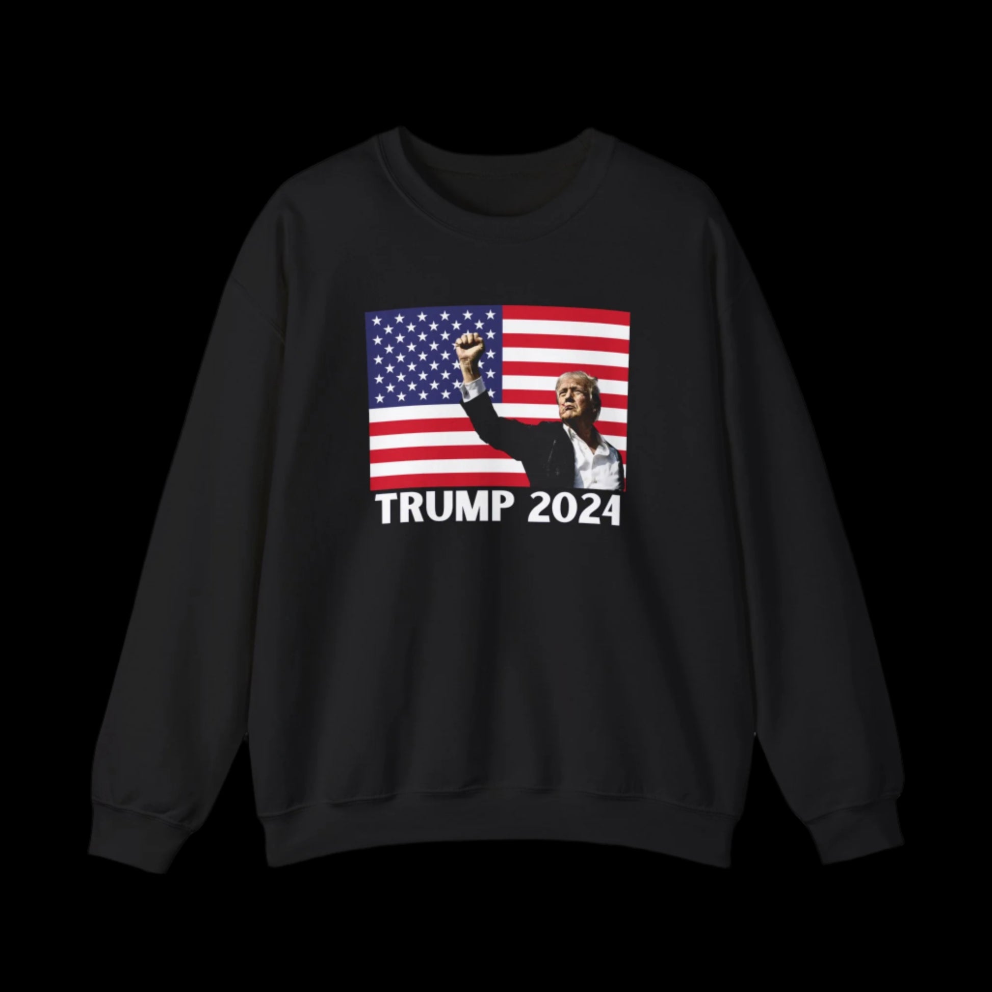 This black heavy blend crewneck sweatshirt showcases a striking image of a person in a suit raising a fist before the U.S. flag, emblazoned with TRUMP 2024. Crafted with OEKO-TEX-certified materials, this piece combines style and comfort for Trump sweatshirt enthusiasts.