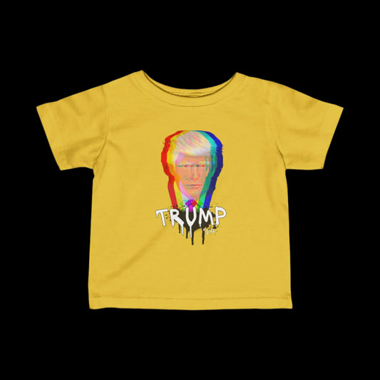 A yellow cotton infant tee features a stylized image of a persons face in colorful glitch art. Below the image, TRUMP is rendered in a graffiti-like, dripping effect. The shirt stands out boldly against a black background.