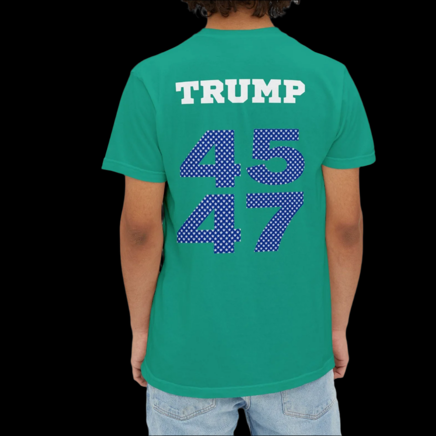 A person in a garment-dyed island green T-shirt with Trump 4547 emblazoned on the back stands facing away, sporting light blue jeans.