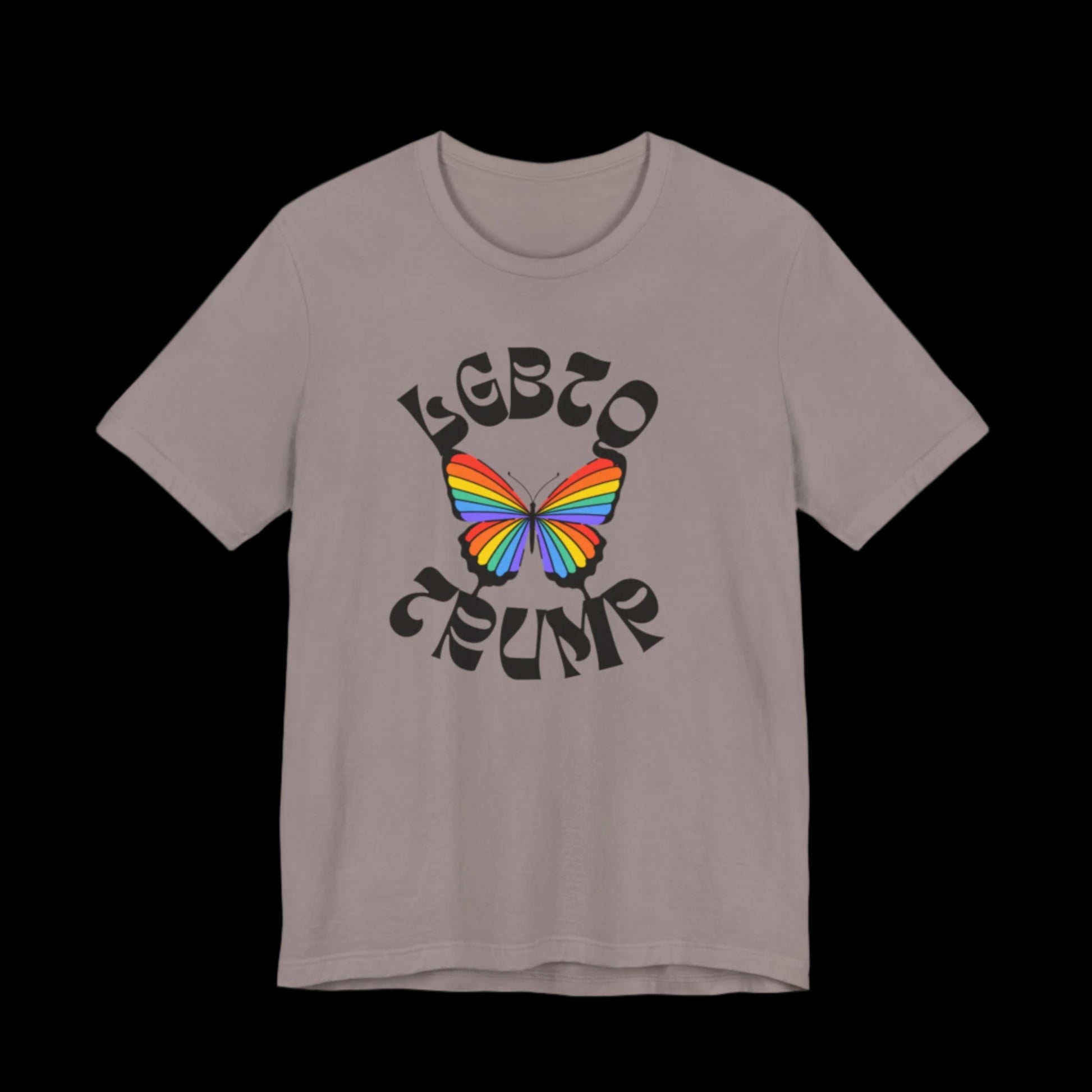 A pebble brown color unisex T-shirt showcases the words LGBTQ PRIDE encircling a butterfly with vibrant rainbow wings.