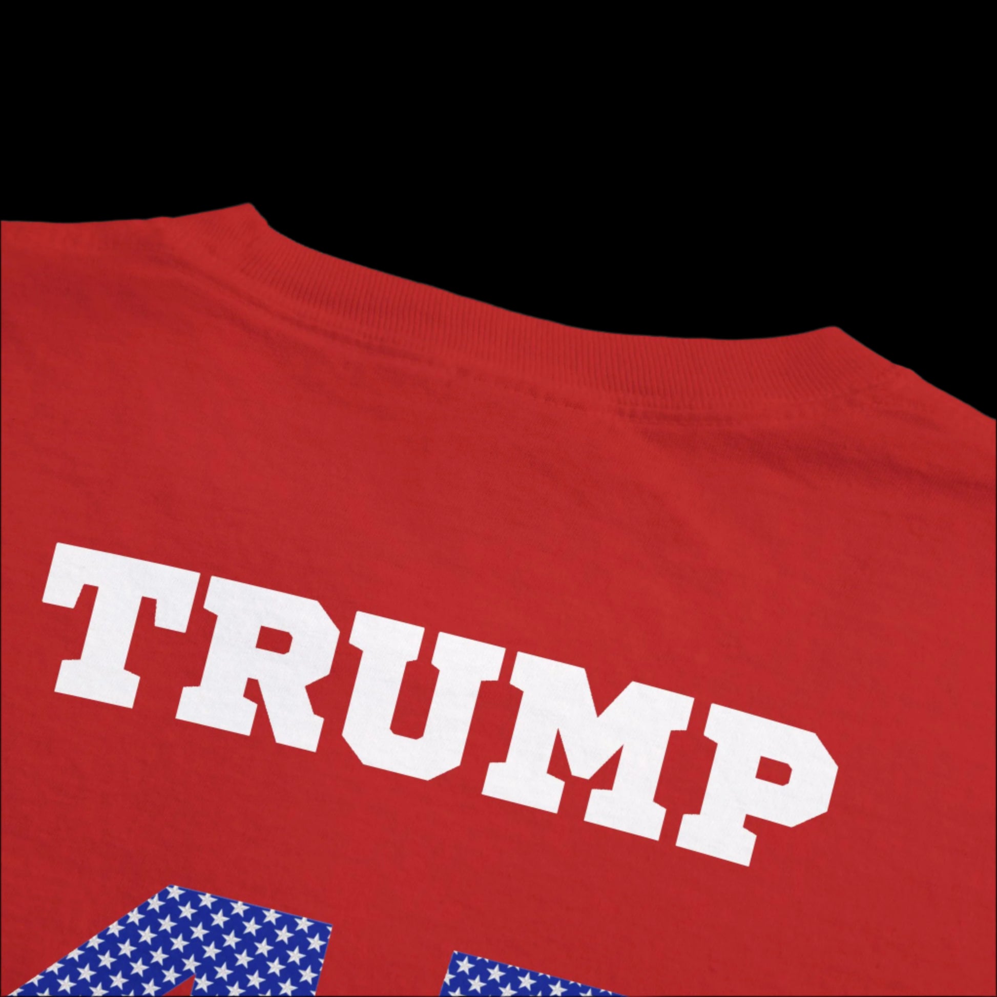 This garment-dyed, red sports jersey t-shirt features TRUMP in bold white letters on the back. Below, blue numbers with white stars read 4547, enhancing the political or sports theme of this eye-catching design.