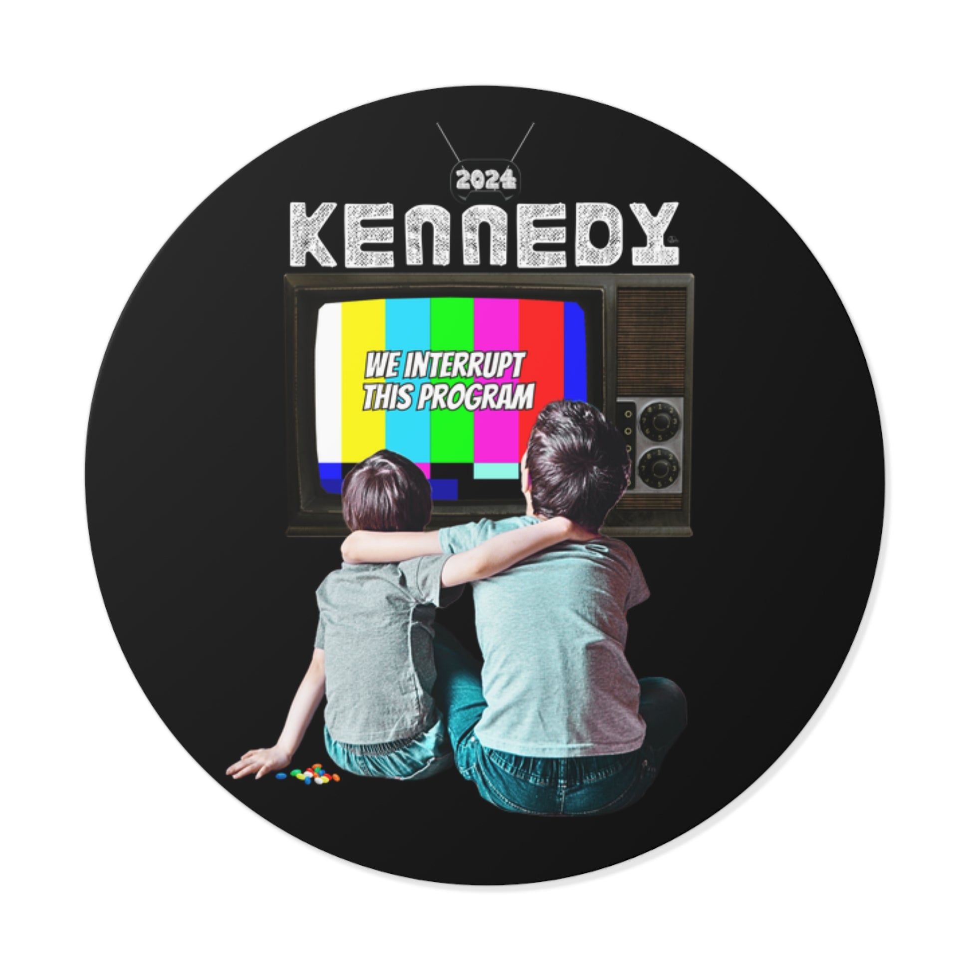 Two children sit on the floor watching a vintage Kennedy TV displaying a color test pattern with the text We interrupt this program. Above is the word KENNEDY 2024 reminiscent of a retro RFK Jr. vinyl sticker.