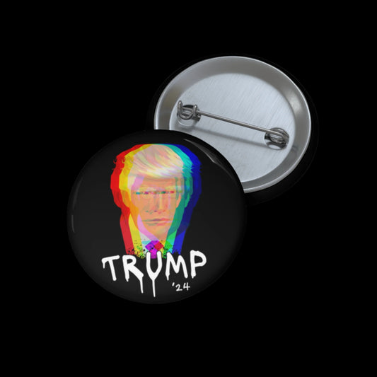 A round pin button showcasing a stylized, multicolored image of Donald Trump with the word TRUMP 24 beneath, rendered with a distorted glitch effect reminiscent of Trump-graffiti art. The back features a standard metal pin clasp and is UV resistant to maintain its vivid design.