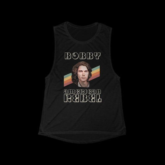 A black sleeveless shirt with a retro vintage flair features the word BOBBY above a 70's long haired version of RFK Jr.'s face and the phrase American Rebel below. Set against slanted stripes in orange, yellow, and blue, this womens muscle tank exudes classic retro style.